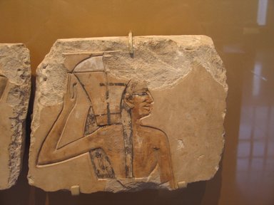  <em>Royal Offering Bearer</em>, ca. 2008–1957 B.C.E. Limestone, pigment, 9 5/16 x 11 1/4 in. (23.7 x 28.5 cm). Brooklyn Museum, Charles Edwin Wilbour Fund, 56.126. Creative Commons-BY (Photo: Brooklyn Museum, CUR.56.126_erg2.jpg)