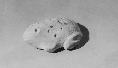  <em>Statuette of a Toad</em>, ca. 3100-2800 B.C.E. Limestone, 1 1/16 × 2 11/16 in. (2.7 × 6.8 cm). Brooklyn Museum, Charles Edwin Wilbour Fund, 57.165.4. Creative Commons-BY (Photo: Brooklyn Museum, CUR.57.165.4_NegID_57.165.2_GRPA_print_cropped_bw.jpg)