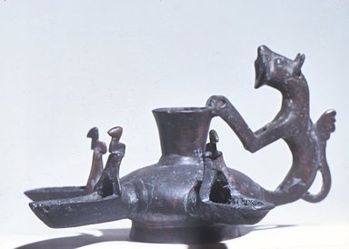 Coptic. <em>Lamp</em>, 7th-9th century C.E. Bronze, 6 5/16 x Diameter 12 3/8 in. (16.1 x 31.5 cm). Brooklyn Museum, Charles Edwin Wilbour Fund, 57.65. Creative Commons-BY (Photo: Brooklyn Museum, CUR.57.65.jpg)