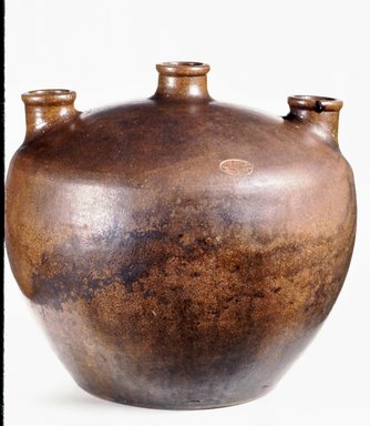 Charles Graham Chemical Pottery Works (1878–ca. 1913). <em>Yeast Jar</em>, late 19th century. Earthenware, 13 3/16 × 15 in. (33.5 × 38.1 cm). Brooklyn Museum, Gift of the Jerome Levy Foundation, 58.3. Creative Commons-BY (Photo: Brooklyn Museum, CUR.58.3.jpg)