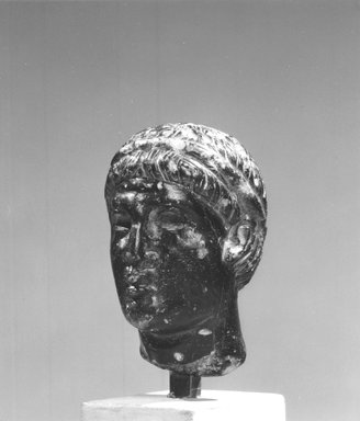  <em>Head of a Man from a Statuette</em>, 2nd-1st century B.C.E. (probably). Steatite, Accession Cards: Measurements: Height 4.8 cm., width 3.1 cm. Brooklyn Museum, Charles Edwin Wilbour Fund, 58.77. Creative Commons-BY (Photo: Brooklyn Museum, CUR.58.77_NegB_print.bw.jpg)