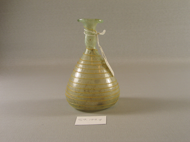  <em>Flask with Spiral Trailing</em>, 4th century C.E. Glass, 4 x Diam. 2 9/16 in. (10.2 x 6.5 cm). Brooklyn Museum, Charles Edwin Wilbour Fund, 59.199.4. Creative Commons-BY (Photo: Brooklyn Museum, CUR.59.199.4_view1.jpg)