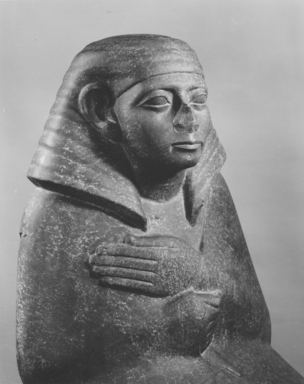  <em>Cloaked Official</em>, ca. 1759-1675 B.C.E. Quartzite, 27 1/2 in. (69.8 cm). Brooklyn Museum, Charles Edwin Wilbour Fund, 62.77.1. Creative Commons-BY (Photo: , CUR.62.77.1_NegH2_print_bw.jpg)