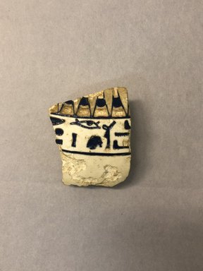  <em>Fragment of a Vessel</em>, ca. 1390-1352 B.C.E. Faience, 2 7/16 × 2 × 13/16 in. (6.2 × 5.1 × 2.1 cm). Brooklyn Museum, Gift of Michael Abemayor, 62.98.1. Creative Commons-BY (Photo: , CUR.62.98.1_view01.jpg)