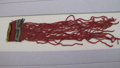 Nasca-Wari. <em>Textile Fragment, undetermined</em>, 200-1000 C.E. Camelid fiber, 12 1/4 × 2 1/2 in. (31.1 × 6.4 cm). Brooklyn Museum, Gift of Adelaide Goan, 64.114.185 (Photo: , CUR.64.114.185.jpg)