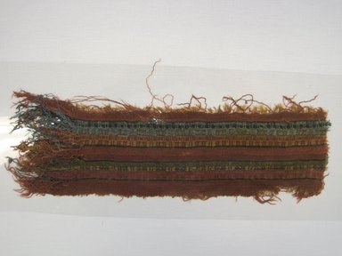 Inca/Moquegua. <em>Textile Fragment, undetermined</em>, 600-1532. Camelid fiber, 15 3/4 x 4 5/16 in. (40.0 x 11.0 cm). Brooklyn Museum, Gift of Adelaide Goan, 64.114.193 (Photo: Brooklyn Museum, CUR.64.114.193.jpg)