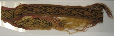 Chancay. <em>Possible Belt or Headband</em>, 1000-1532. Cotton, camelid fiber, 11 x 1 3/8in. (28 x 3.5cm). Brooklyn Museum, Gift of Adelaide Goan, 64.114.208 (Photo: , CUR.64.114.208.jpg)