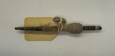  <em>Spindle, Fragment</em>, Undetermined or 1000-1400. Wood, pigment, cotton, 3/8 x 3/8 x 3 9/16 in. (1 x 1 x 9 cm). Brooklyn Museum, Gift of Adelaide Goan, 64.114.30 (Photo: Brooklyn Museum, CUR.64.114.30.jpg)
