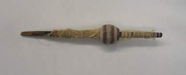  <em>Spindle and Whorl, Fragment</em>, 1000–1400. Wood, pigment, camelid fiber, 1/2 x 1/2 x 4 1/4 in. (1.3 x 1.3 x 10.8 cm). Brooklyn Museum, Gift of Adelaide Goan, 64.114.31 (Photo: Brooklyn Museum, CUR.64.114.31.jpg)