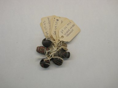  <em>Spindle Whorl</em>, 1000-1532. Clay, pigment Brooklyn Museum, Gift of Adelaide Goan, 64.114.39 (Photo: , CUR.64.114.39-.44.jpg)