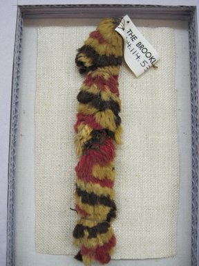 Coastal Wari. <em>Textile Fragment, undetermined or possible Headband, Fragment</em>, 600-1000 C.E. Camelid fiber, 5 1/2 x 1in. (14 x 2.5cm). Brooklyn Museum, Gift of Adelaide Goan, 64.114.53 (Photo: , CUR.64.114.53_view01.jpg)