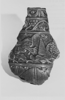  <em>Vessel Fragment</em>, 305-30 B.C.E. Faience, Height 13.3 cm., w. ca. 9 cm., thickness 6 mm. Brooklyn Museum, Charles Edwin Wilbour Fund, 64.145. Creative Commons-BY (Photo: , CUR.64.145_NegA_print_bw.jpg)