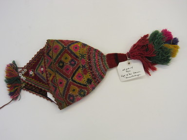 Quechua. <em>Hat</em>. Camelid fiber, wool, plastic buttons, 9 1/4 × 22 1/4 in. (23.5 × 56.5 cm). Brooklyn Museum, Gift of Dr. Werner Muensterberger, 64.210.14. Creative Commons-BY (Photo: , CUR.64.210.14.jpg)
