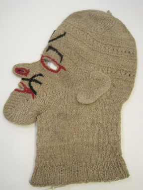 Quechua. <em>Knitted Mask</em>, 20th century. Camelid fiber? wool?, 9 1/4 × 1/4 × 13 1/8 in. (23.5 × 0.6 × 33.3 cm). Brooklyn Museum, Gift of Dr. Werner Muensterberger, 64.210.15. Creative Commons-BY (Photo: , CUR.64.210.15.jpg)