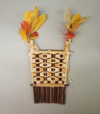 Possibly Tapirape. <em>Comb</em>, 20th century. Cane, cotton, feathers, 10 1/8 × 7 7/8 × 1 1/2 in. (25.7 × 20 × 3.8 cm). Brooklyn Museum, A. Augustus Healy Fund, 64.214.13. Creative Commons-BY (Photo: Brooklyn Museum, CUR.64.214.13.jpg)