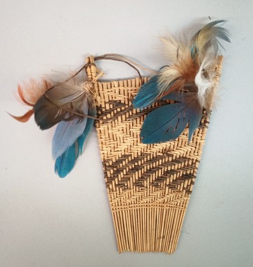 Possibly Tapirape. <em>Comb</em>, 20th century. Cane, cotton, feathers, 5 1/2 × 4 7/8 × 1 3/4 in. (14 × 12.4 × 4.4 cm). Brooklyn Museum, A. Augustus Healy Fund, 64.214.25. Creative Commons-BY (Photo: Brooklyn Museum, CUR.64.214.25.jpg)