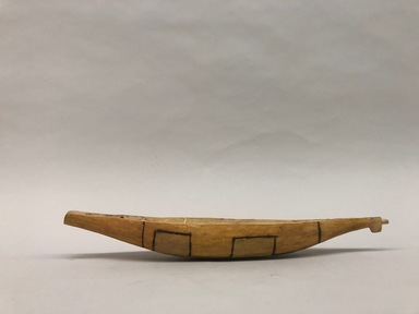  <em>Toy Dugout Canoe</em>, 20th century. Wood, pigment, 2 × 2 1/2 × 15 in. (5.1 × 6.4 × 38.1 cm). Brooklyn Museum, A. Augustus Healy Fund, 64.214.37. Creative Commons-BY (Photo: Brooklyn Museum, CUR.64.214.37_view01.jpeg)