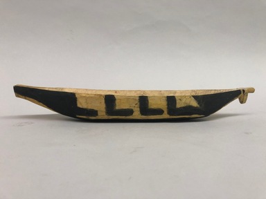  <em>Toy Dugout Canoe</em>, 20th century. Wood, pigment, 1 1/2 × 2 × 12 in. (3.8 × 5.1 × 30.5 cm). Brooklyn Museum, A. Augustus Healy Fund, 64.214.43. Creative Commons-BY (Photo: Brooklyn Museum, CUR.64.214.43_view01.jpeg)