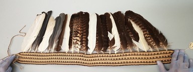  <em>Belt</em>, 20th century. Fiber, feathers, 11 1/2 × 3/4 × 29 1/2 in. (29.2 × 1.9 × 74.9 cm). Brooklyn Museum, A. Augustus Healy Fund, 64.214.5. Creative Commons-BY (Photo: Brooklyn Museum, CUR.64.214.5.jpg)