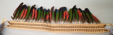  <em>Belt</em>, 20th century. Fiber, feathers, 7 7/8 × 15/16 × 27 7/16 in. (20 × 2.4 × 69.7 cm). Brooklyn Museum, A. Augustus Healy Fund, 64.214.7. Creative Commons-BY (Photo: Brooklyn Museum, CUR.64.214.7.jpg)