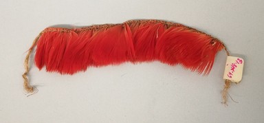 Kaapor. <em>Bracelet</em>, 20th century. Feathers, plant fiber, 1 1/16 × 5/8 × 4 in. (2.7 × 1.6 × 10.2 cm), not including ties. Brooklyn Museum, Gift of Ingeborg de Beausacq, 64.248.13. Creative Commons-BY (Photo: Brooklyn Museum, CUR.64.248.13.jpg)