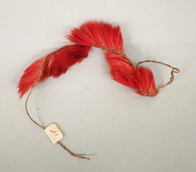 Kaapor. <em>Bracelet</em>, 20th century. Feathers, plant fiber, 13/16 × 1/4 × 6 3/16 in. (2.1 × 0.6 × 15.7 cm), not including ties. Brooklyn Museum, Gift of Ingeborg de Beausacq, 64.248.15. Creative Commons-BY (Photo: Brooklyn Museum, CUR.64.248.15.jpg)