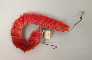 Kaapor. <em>Bracelet</em>, 20th century. Feathers, plant fiber, 13/16 × 3/4 × 6 1/8 in. (2.1 × 1.9 × 15.6 cm), not including ties. Brooklyn Museum, Gift of Ingeborg de Beausacq, 64.248.17. Creative Commons-BY (Photo: Brooklyn Museum, CUR.64.248.17.jpg)