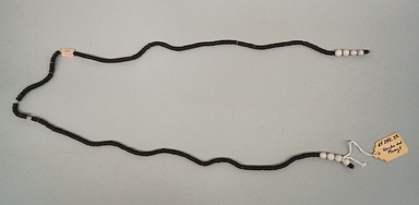 Kaapor. <em>String Worn with Bracelet</em>, 20th century. Seed beads, cotton, 1/4 × 1/4 × 31 1/2 in. (0.6 × 0.6 × 80 cm). Brooklyn Museum, Gift of Ingeborg de Beausacq, 64.248.22. Creative Commons-BY (Photo: Brooklyn Museum, CUR.64.248.22.jpg)