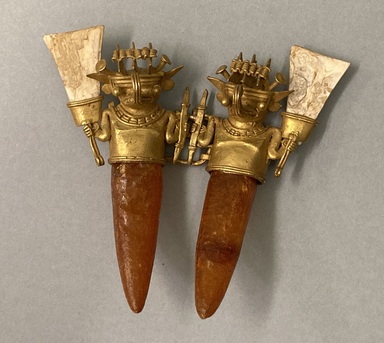 Coclé. <em>Pendant</em>, 1050-1500 CE. Gold, resin, shell, 4 3/8 x 4 3/4 x 1 3/8 in. (11.1 x 12.1 x 3.5 cm). Brooklyn Museum, By exchange, 64.33.1. Creative Commons-BY (Photo: Brooklyn Museum, CUR.64.33.1_overall.jpg)