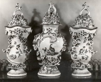 Chelsea/Derby (probably). <em>Three-Piece Set, Garniture (Covered Vases)</em>, ca. 1770-1780. Porcelain, 11 3/4 in. (29.8 cm). Brooklyn Museum, Gift of Mr. and Mrs. Daniel L. Silberberg, 64.85.3a-c. Creative Commons-BY (Photo: , CUR.64.85.3a-c_print_bw.jpg)