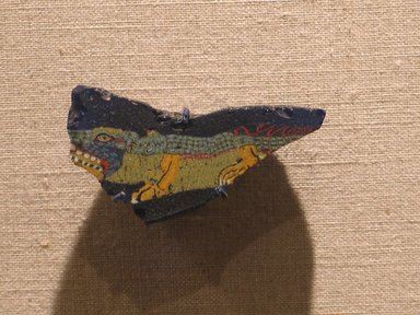  <em>Plaque with Crocodile</em>, 305-30 B.C.E. Glass, 13/16 x 1 5/8 x 5/8 in. (2 x 4.1 x 1.6 cm). Brooklyn Museum, Charles Edwin Wilbour Fund, 65.132. Creative Commons-BY (Photo: Brooklyn Museum, CUR.65.132_wwg8.jpg)