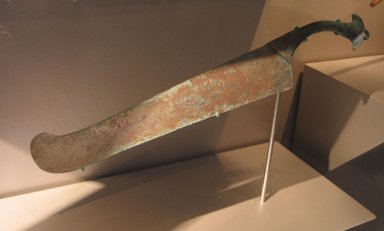  <em>Ceremonial Saw in the Shape of a Ma`at-Feather</em>, ca. 1353-1336 B.C.E. Bronze, 12 3/8 x 1 5/8 in. (31.5 x 4.2 cm). Brooklyn Museum, Charles Edwin Wilbour Fund, 65.133. Creative Commons-BY (Photo: Brooklyn Museum, CUR.65.133_erg456.jpg)