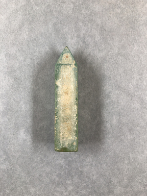  <em>Obelisk</em>, ca. 1075–332 B.C.E. Glass, 2 5/16 × 11/16 × 11/16 in. (5.9 × 1.8 × 1.8 cm). Brooklyn Museum, Charles Edwin Wilbour Fund, 65.134.2. Creative Commons-BY (Photo: , CUR.65.134.2_view01.jpg)