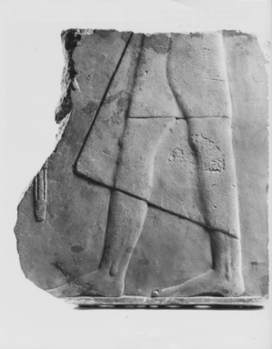  <em>Fragment of a Relief</em>, 664–332 B.C.E. Limestone, 6 15/16 x 6 5/16 x 11/16 in. (17.7 x 16 x 1.8 cm). Brooklyn Museum, Anonymous gift, 65.194.1. Creative Commons-BY (Photo: , CUR.65.194.1_NegA_print_bw.jpg)