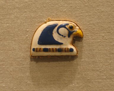  <em>Terminal from a Broad Collar</em>, 305–30 B.C.E. Gold, glass, 1 3/8 x 1 3/4 x 1/4 in. (3.5 x 4.5 x 0.7 cm). Brooklyn Museum, Charles Edwin Wilbour Fund, 65.3.2. Creative Commons-BY (Photo: Brooklyn Museum, CUR.65.3.2_wwg8.jpg)