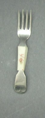  <em>Child's Dinner Fork</em>, ca. 1880. White metal, 2 5/8 in. (6.7 cm). Brooklyn Museum, Gift of Amelia Beard Hollenback, 66.25.46. Creative Commons-BY (Photo: Brooklyn Museum, CUR.66.25.46.jpg)