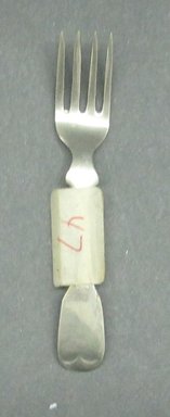  <em>Child's Dinner Fork</em>, ca. 1880. White metal, 2 5/8 in. (6.7 cm). Brooklyn Museum, Gift of Amelia Beard Hollenback, 66.25.47. Creative Commons-BY (Photo: Brooklyn Museum, CUR.66.25.47.jpg)