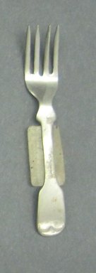  <em>Child's Dinner Fork</em>, ca. 1880. White metal, 2 5/8 in. (6.7 cm). Brooklyn Museum, Gift of Amelia Beard Hollenback, 66.25.49. Creative Commons-BY (Photo: Brooklyn Museum, CUR.66.25.49.jpg)