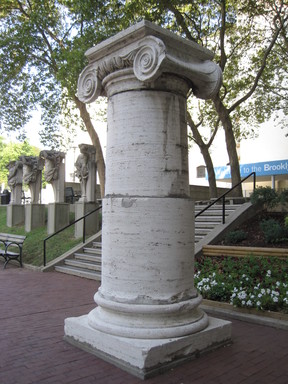 Charles Follen McKim. <em>Partial Column, from Penn Station, 31st to 33rd Streets between 7th and 8th Avenues, NYC (demolished 1964)</em>, ca. 1910. Travertine marble, 145 x 136 in. (368.3 x 345.4 cm). Brooklyn Museum, Gift of Lipsett Incorported, 66.250.2. Creative Commons-BY (Photo: Brooklyn Museum, CUR.66.250.2.jpg)