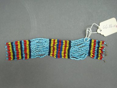 Possibly Zulu. <em>Ankle or Wrist Cuffs</em>, mid-20th century. Glass seed beads, natural fiber, a: 6 1/2 x 1 1/2 in. (16.5 x 3.8 cm). Brooklyn Museum, Gift of Mr. and Mrs. Jerome Blum, 66.86.10a-d. Creative Commons-BY (Photo: Brooklyn Museum, CUR.66.86.10d_overall.jpg)