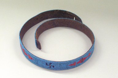 Native American (unidentified). <em>Belt</em>, 20th century. Beads, hide, 40 11/16 x 1 9/16 in.  (103.3 x 3.9 cm). Brooklyn Museum, Gift of Mr. and Mrs. Jerome Blum, 66.86.28. Creative Commons-BY (Photo: Brooklyn Museum, CUR.66.86.28_view1.jpg)
