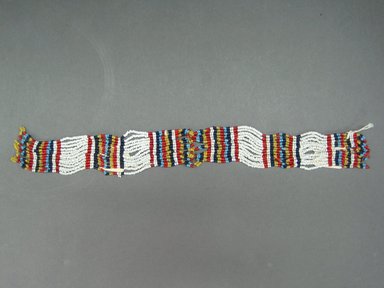 Possibly Zulu. <em>Cuffs for Ankle or Wrist</em>, mid-20th century. Glass seed beads, natural fiber, 6 3/4 x 1 1/2 in. (17.1 x 3.8 cm). Brooklyn Museum, Gift of Mr. and Mrs. Jerome Blum, 66.86.7a-b. Creative Commons-BY (Photo: Brooklyn Museum, CUR.66.86.7a-b.jpg)