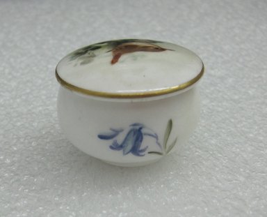 Worcester Royal Porcelain Co. (founded 1751). <em>Miniature Chamber Pot and Cover</em>, ca. 1920. Decorated porcelain, 1 1/8 x 1 3/8 in. (2.9 x 3.5 cm). Brooklyn Museum, Bequest of Laura L. Barnes, 67.120.166a-b. Creative Commons-BY (Photo: Brooklyn Museum, CUR.67.120.166a-b_back.jpg)