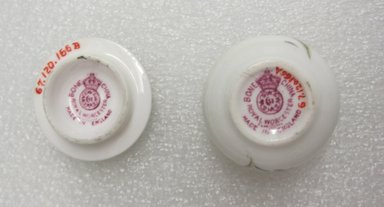 Worcester Royal Porcelain Co. (founded 1751). <em>Miniature Chamber Pot and Cover</em>, ca. 1920. Decorated porcelain, 1 1/8 x 1 3/8 in. (2.9 x 3.5 cm). Brooklyn Museum, Bequest of Laura L. Barnes, 67.120.166a-b. Creative Commons-BY (Photo: Brooklyn Museum, CUR.67.120.166a-b_bottom.jpg)