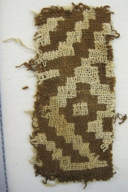 Possibly Chancay. <em>Textile Fragment, undetermined</em>, 1000-1700. Cotton, 4 3/4 × 2 1/4 in. (12.1 × 5.7 cm). Brooklyn Museum, Gift of Adelaide Goan, 67.159.59. Creative Commons-BY (Photo: Brooklyn Museum, CUR.67.159.59.jpg)
