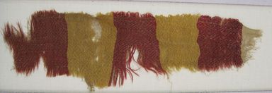 Possibly Chimú. <em>Textile Fragment, undetermined</em>, 1000-1532. Cotton, camelid fiber, 11 7/16 x 3 1/8in. (29.0 x 8.0 cm). Brooklyn Museum, Gift of Adelaide Goan, 67.159.7. Creative Commons-BY (Photo: , CUR.67.159.7.jpg)