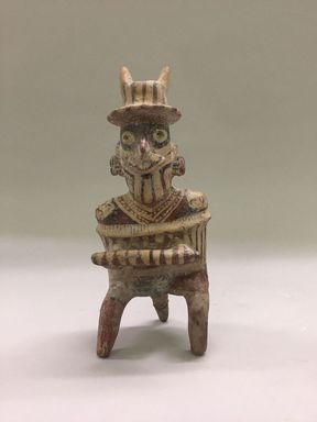 Nayarit. <em>Warrior Figure</em>, 100 B.C.E.- 300 C.E. Ceramic, slip, 9 1/8 × 4 1/4 × 3 1/8 in. (23.2 × 10.8 × 7.9 cm). Brooklyn Museum, Gift of Mr. and Mrs. Marvin Cassell
, 67.206.22. Creative Commons-BY (Photo: Brooklyn Museum, CUR.67.206.22_view01.jpg)