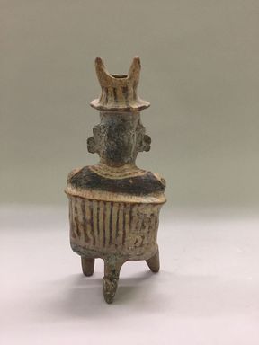 Nayarit. <em>Warrior Figure</em>, 100 B.C.E.- 300 C.E. Ceramic, slip, 9 1/8 × 4 1/4 × 3 1/8 in. (23.2 × 10.8 × 7.9 cm). Brooklyn Museum, Gift of Mr. and Mrs. Marvin Cassell
, 67.206.22. Creative Commons-BY (Photo: Brooklyn Museum, CUR.67.206.22_view03.jpg)
