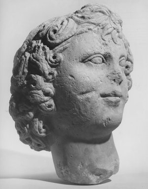  <em>Head of a Youth</em>. Limestone, 10 1/16 x 7 7/8 x 7 1/2 in. (25.6 x 20 x 19 cm). Brooklyn Museum, Charles Edwin Wilbour Fund, 68.151. Creative Commons-BY (Photo: Brooklyn Museum, CUR.68.151_NegF_print.bw.jpg)