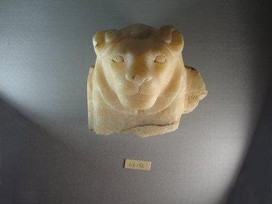  <em>Lion's Head</em>. Egyptian alabaster (calcite), 6 1/2 x 7 3/8 x 5 5/16 in. (16.5 x 18.7 x 13.5 cm). Brooklyn Museum, Charles Edwin Wilbour Fund, 68.152. Creative Commons-BY (Photo: Brooklyn Museum, CUR.68.152_view1.jpg)